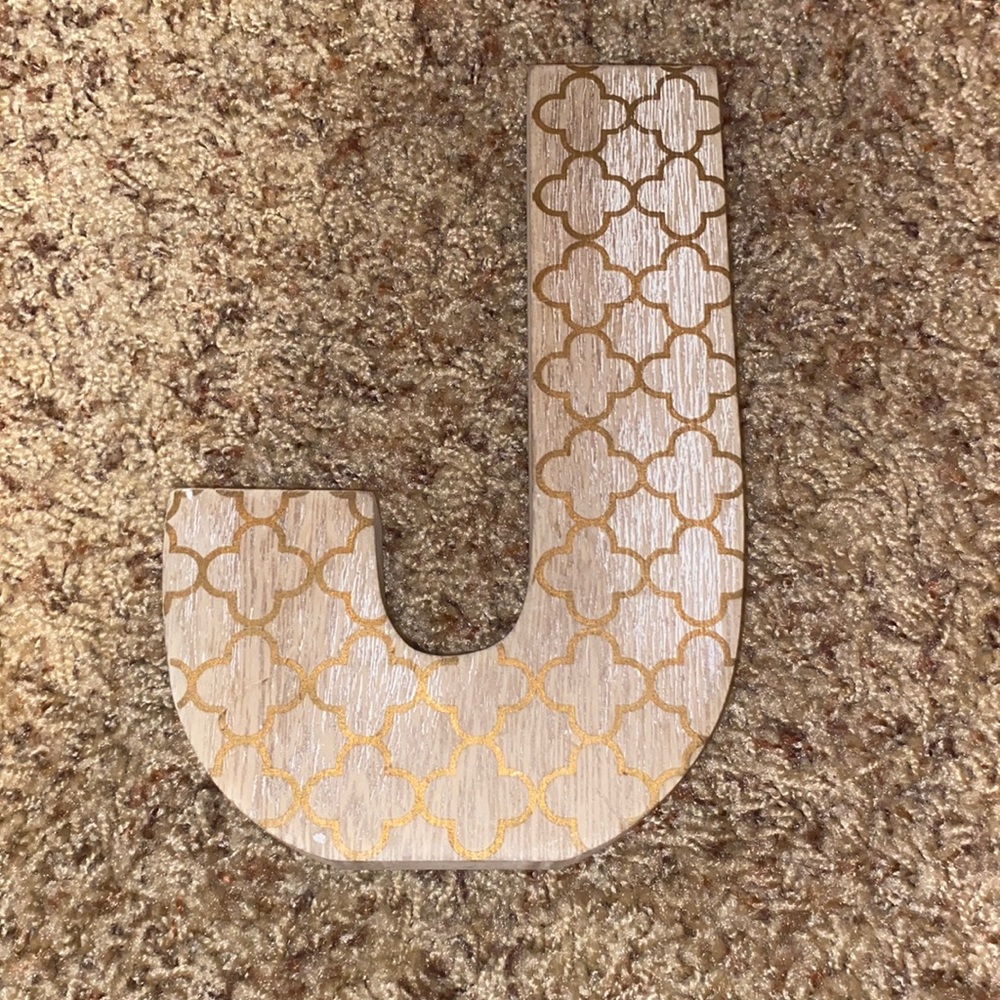 J sign